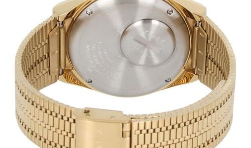 线条流畅的梯形刻度，圆点分针时标腕表。