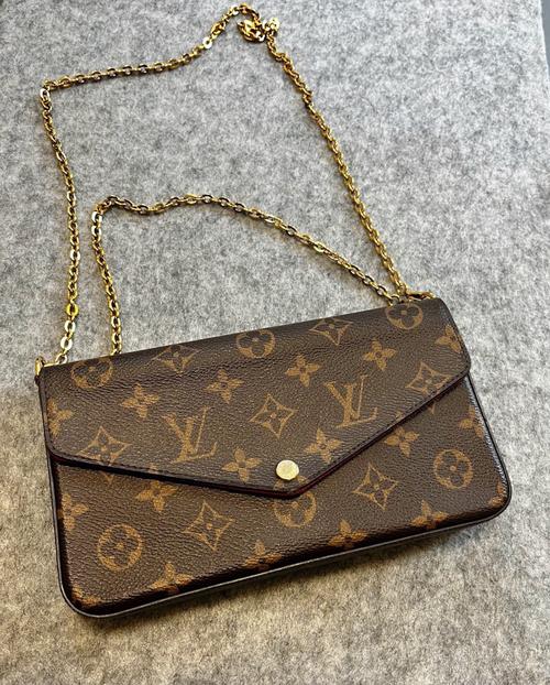 买真皮包包进哪个网站,网购布童之谜包链条坏了店家：可以换