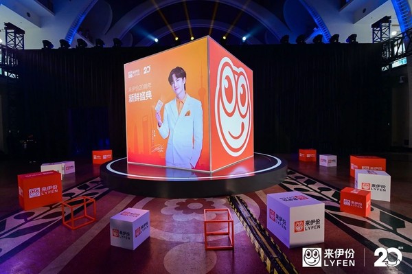 A picture containing indoor, table, sitting, computerDescription automatically generated